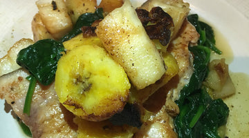 Swordfish with fried plantain & pineapple on a bed of spinach